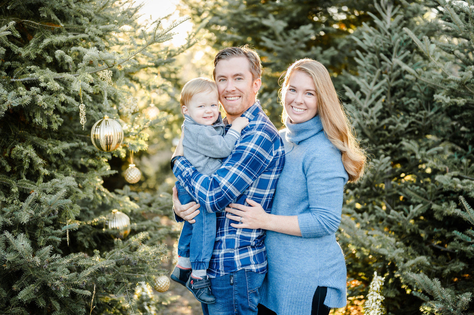 Family at a Christmas tree farm